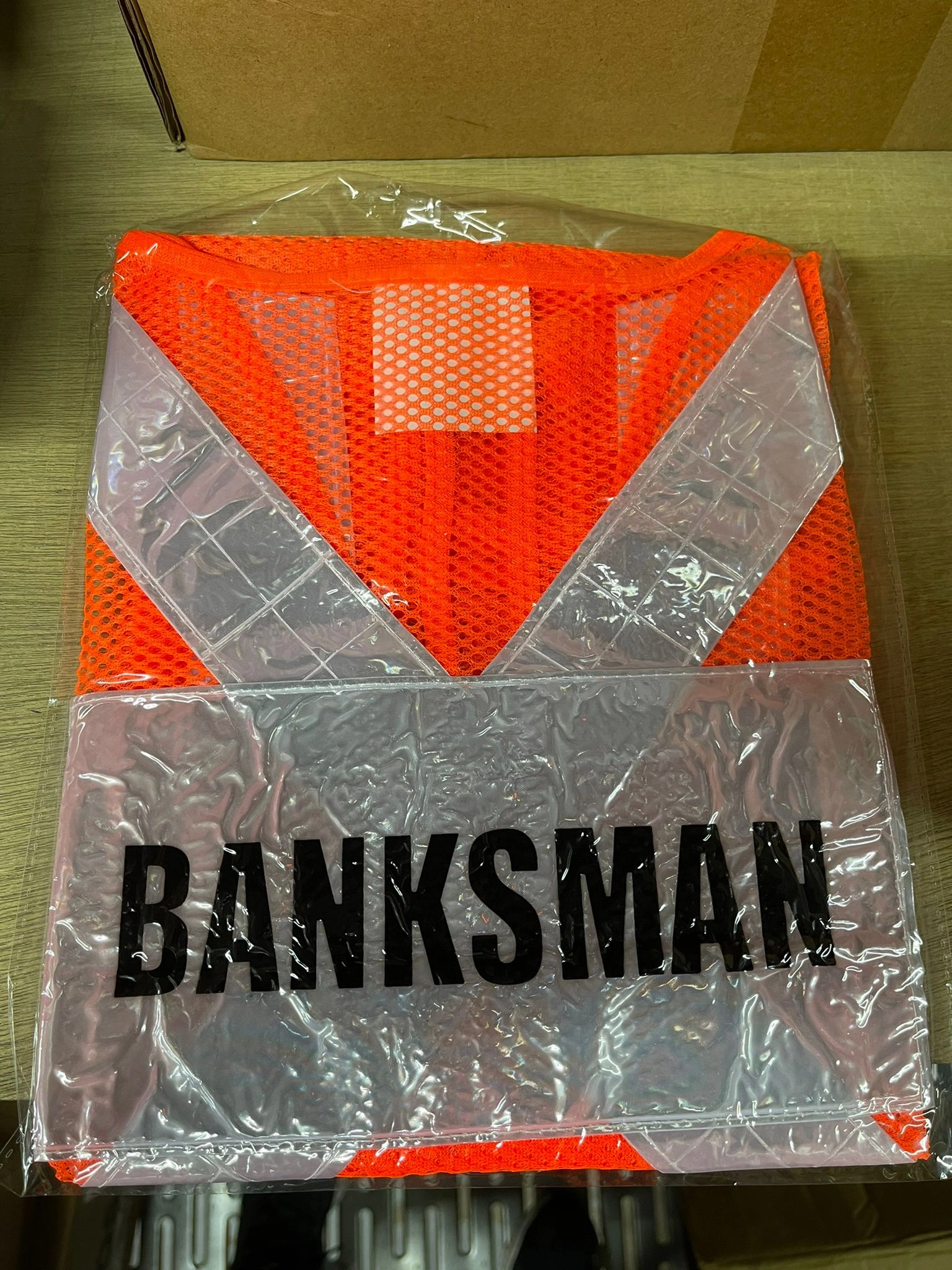 Red Safety Vest with words at back | Wording : Banksman, Fire Watchman, Lifting Supervisor, Rigger/Signal man, Security, Signal man, Traffic Controller